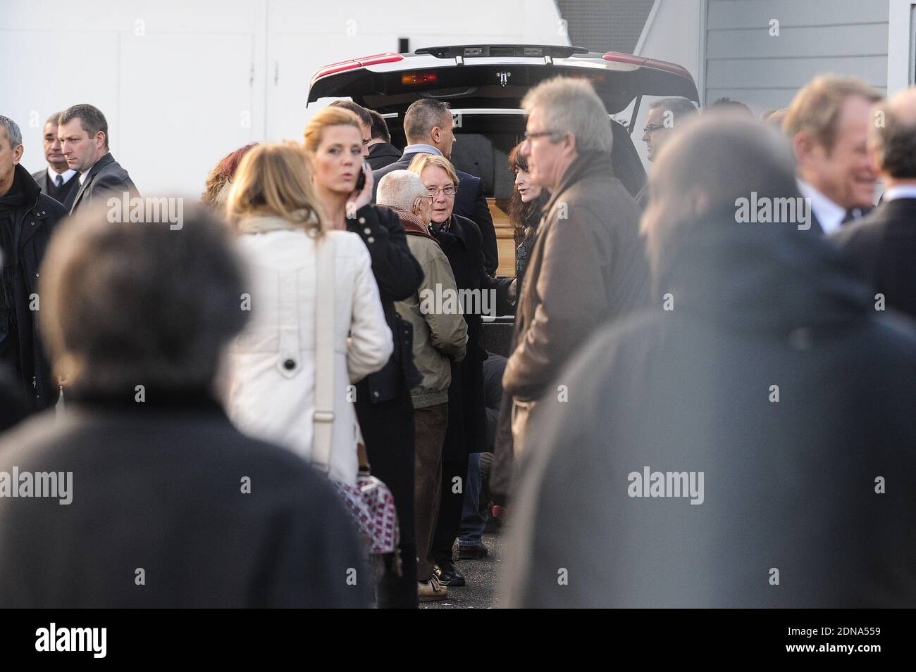 Relatives arriving for the funeral of French cartoonist and Charlie Hebdo editor Stephane 'Charb' Charbonnier, on January 16, 2014 in Pontoise, outside Paris. Twelve people were killed, including cartoonists Charb, Wolinski, Cabu and Tignous and deputy chief editor Bernard Maris when gunmen armed with Kalashnikovs and a rocket-launcher opened fire in the Paris offices of Charlie Hebdo on January 7. Photo by ABACAPRESS.COM Stock Photo