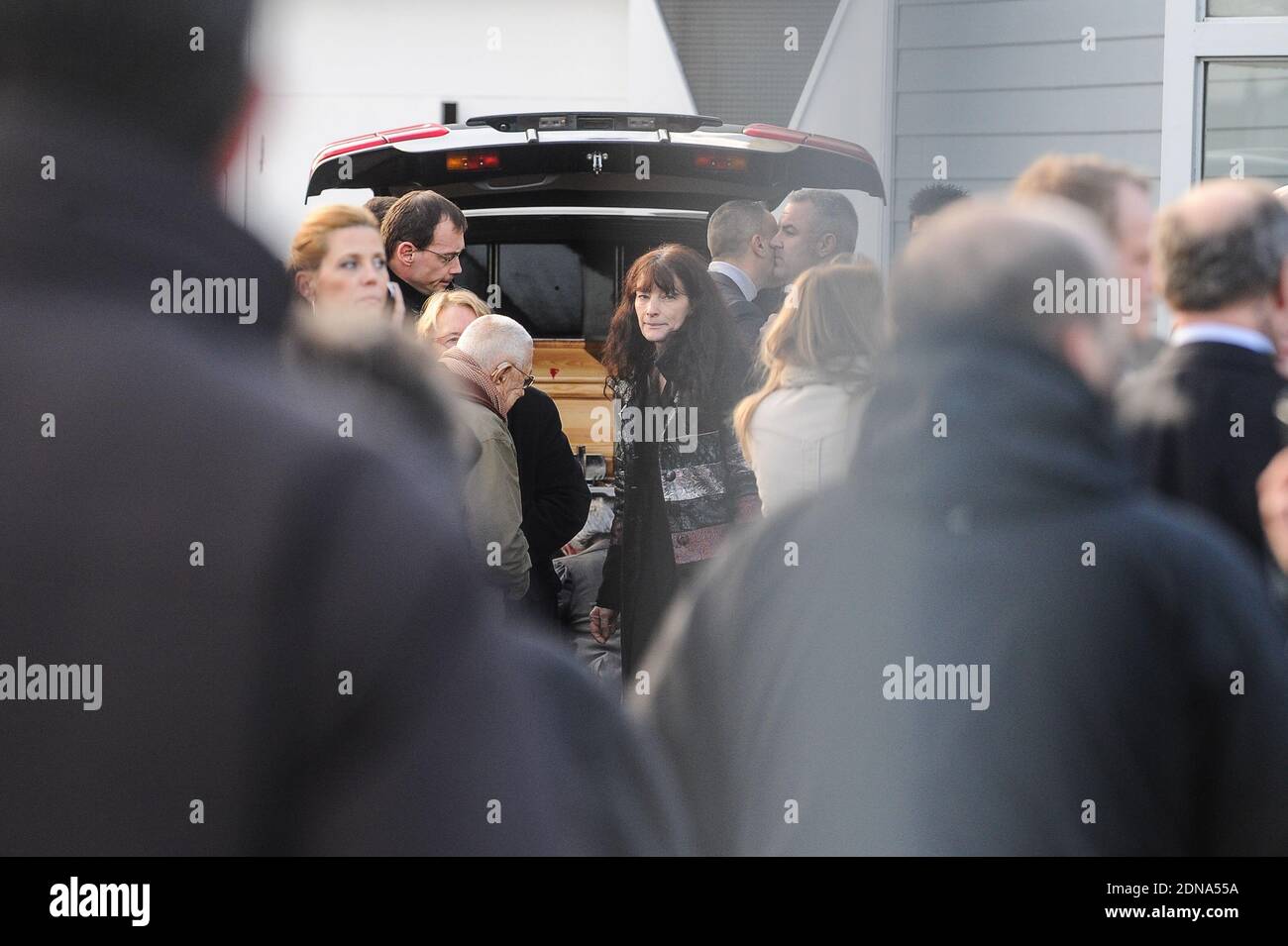 Relatives arriving for the funeral of French cartoonist and Charlie Hebdo editor Stephane 'Charb' Charbonnier, on January 16, 2014 in Pontoise, outside Paris. Twelve people were killed, including cartoonists Charb, Wolinski, Cabu and Tignous and deputy chief editor Bernard Maris when gunmen armed with Kalashnikovs and a rocket-launcher opened fire in the Paris offices of Charlie Hebdo on January 7. Photo by ABACAPRESS.COM Stock Photo