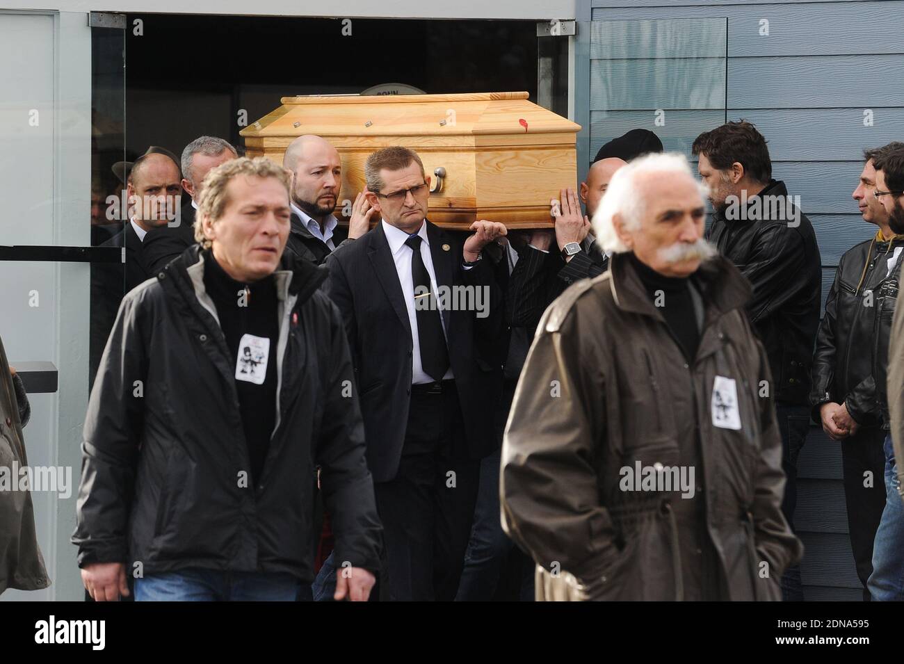 The coffin leaving the funeral of French cartoonist and Charlie Hebdo editor Stephane 'Charb' Charbonnier, on January 16, 2014 in Pontoise, outside Paris. Twelve people were killed, including cartoonists Charb, Wolinski, Cabu and Tignous and deputy chief editor Bernard Maris when gunmen armed with Kalashnikovs and a rocket-launcher opened fire in the Paris offices of Charlie Hebdo on January 7. Photo by ABACAPRESS.COM Stock Photo