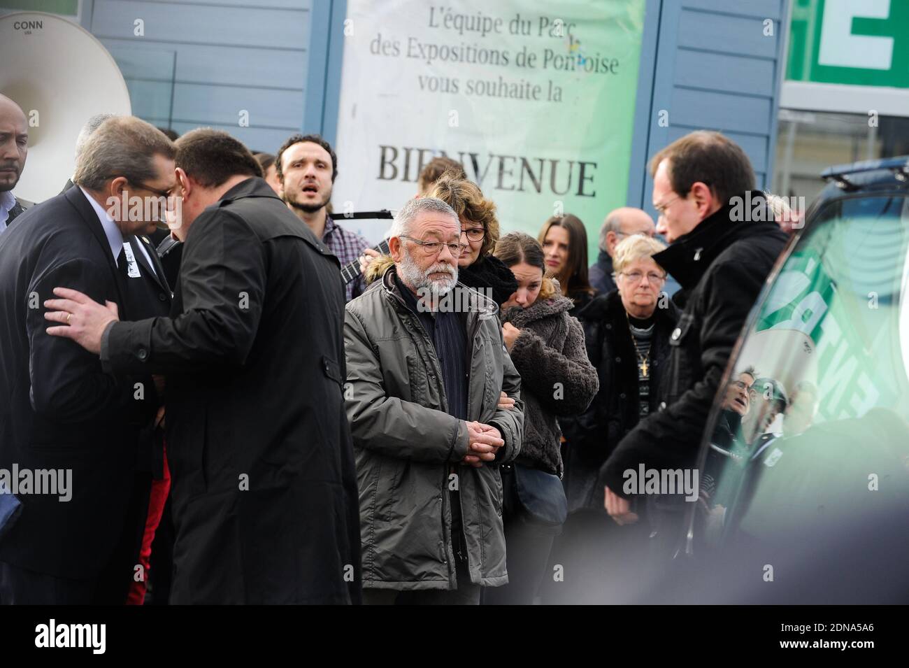 Relatives leaving the funeral of French cartoonist and Charlie Hebdo editor Stephane 'Charb' Charbonnier, on January 16, 2014 in Pontoise, outside Paris. Twelve people were killed, including cartoonists Charb, Wolinski, Cabu and Tignous and deputy chief editor Bernard Maris when gunmen armed with Kalashnikovs and a rocket-launcher opened fire in the Paris offices of Charlie Hebdo on January 7. Photo by ABACAPRESS.COM Stock Photo