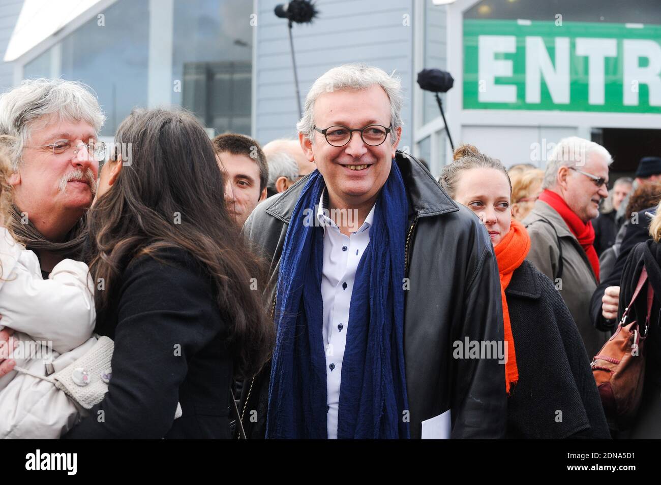 Head of the French Communist Party (PCF) Pierre Laurent leaving the funeral of French cartoonist and Charlie Hebdo editor Stephane 'Charb' Charbonnier, on January 16, 2014 in Pontoise, outside Paris. Twelve people were killed, including cartoonists Charb, Wolinski, Cabu and Tignous and deputy chief editor Bernard Maris when gunmen armed with Kalashnikovs and a rocket-launcher opened fire in the Paris offices of Charlie Hebdo on January 7. Photo by ABACAPRESS.COM Stock Photo