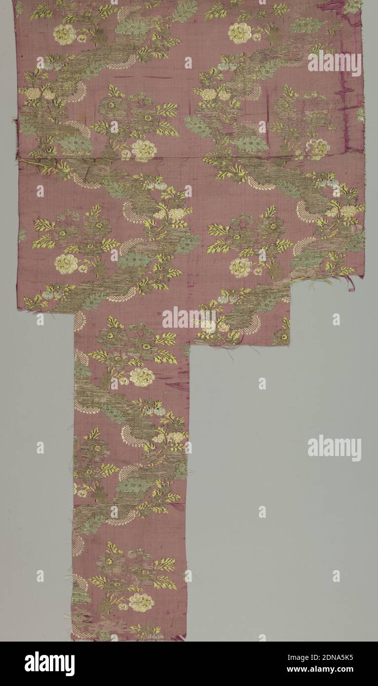 Fragment, Medium: silk, metallic thread Technique: plain cloth, brocaded, a/: a dull pink ground with two serpentine bands of silver thread from which flowering sprays are thrown out in faded pink, yellow and green. See: records for 1941-62-6-b and -c for two other fragments which were a set with -a, but are deaccessioned., France, mid-18th century, woven textiles, Fragment Stock Photo