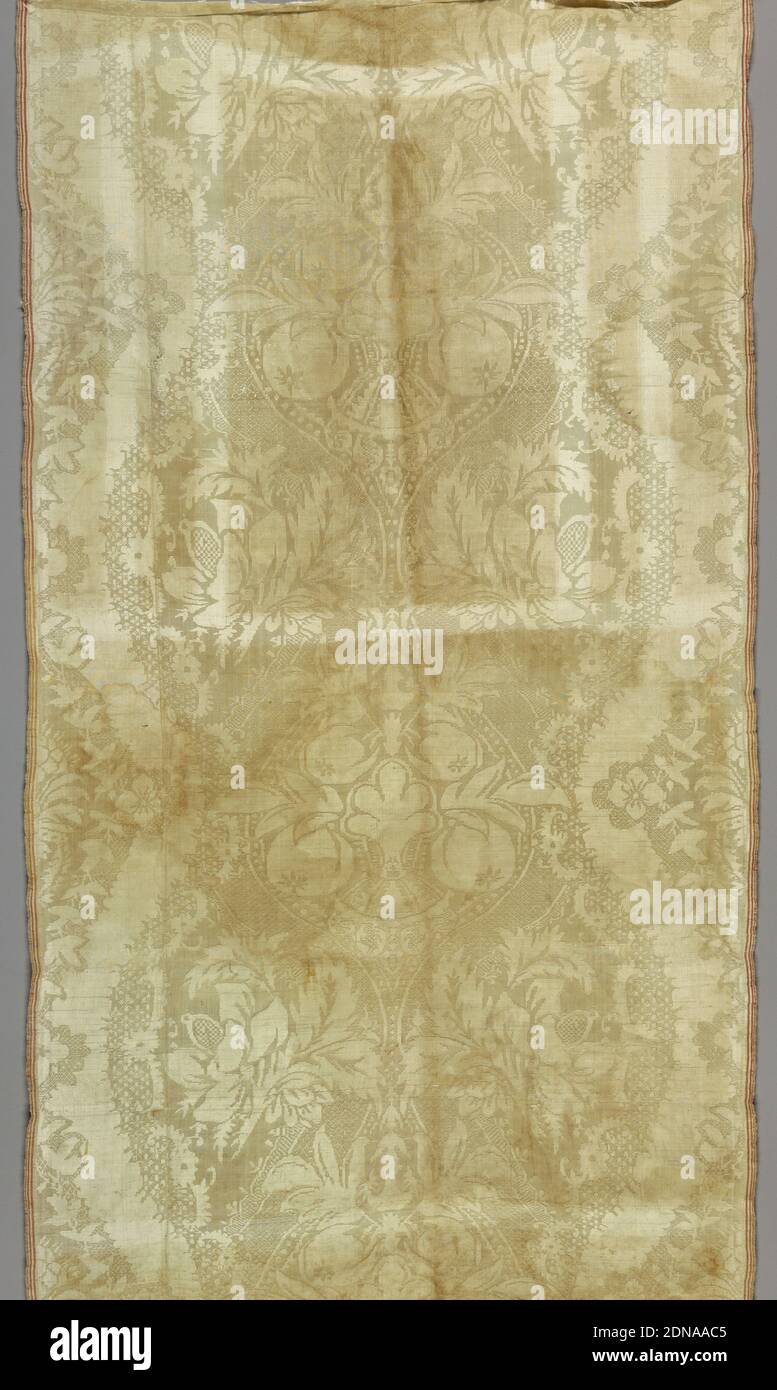 Fragment, Medium: silk Technique: 5-harness satin damask, Pieced white damask with a symmetrical vertical ogival repeat with fruits, flowers, and decorative filling patterns. Selvages have three red stripes., Italy, 18th century, woven textiles, Fragment Stock Photo