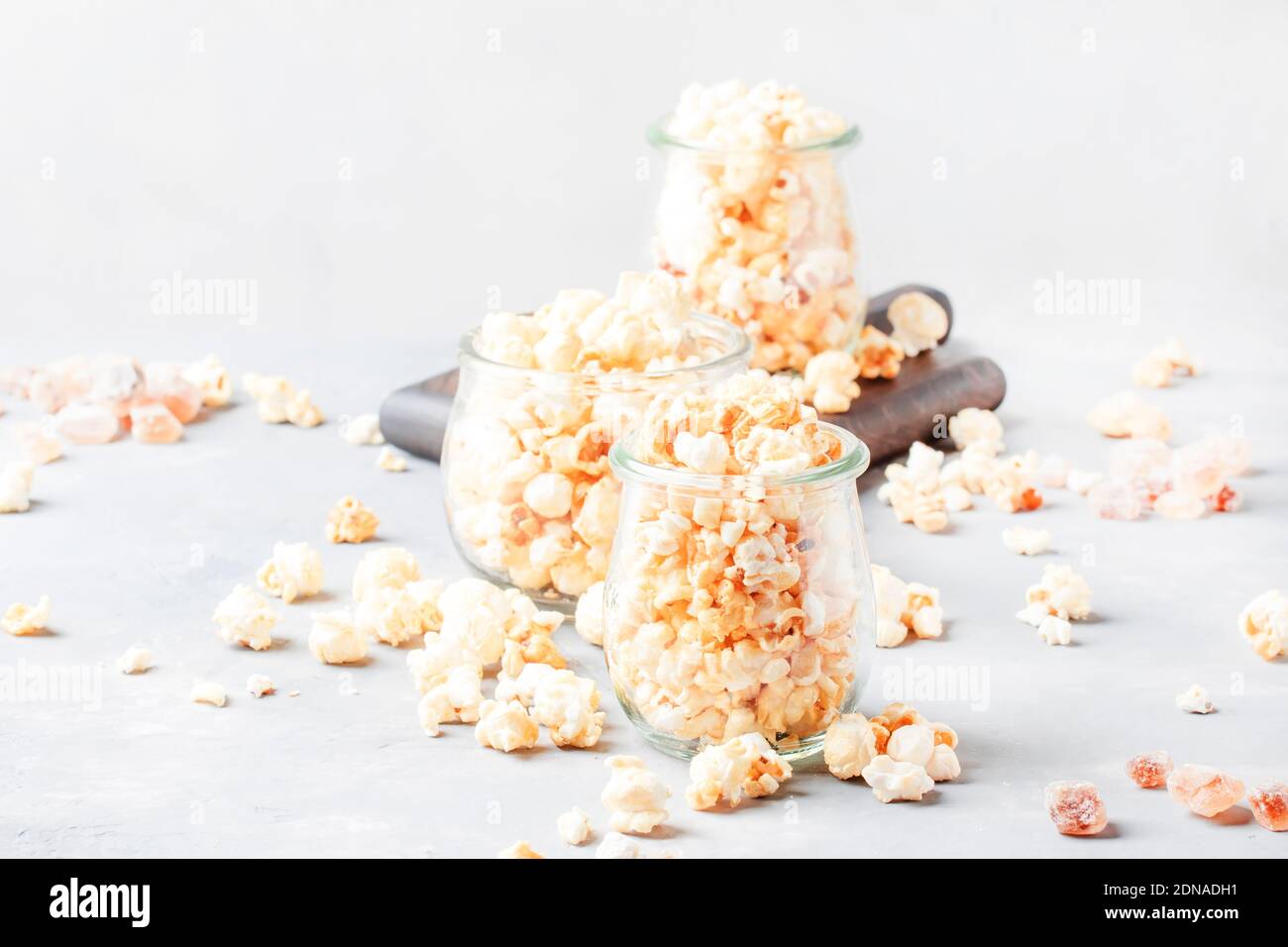 Sweet popcorn, junk food, gray background, selective focus Stock Photo