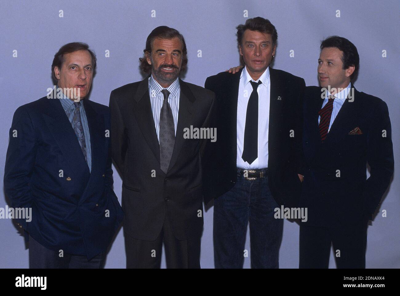 File photo taken in the 80's of Michel Serrault, Jean-Paul Belmondo, Johnny  Hallyday and Michel Drucker. Photo by Pascal Baril/ABACAPRESS.COM Stock  Photo - Alamy
