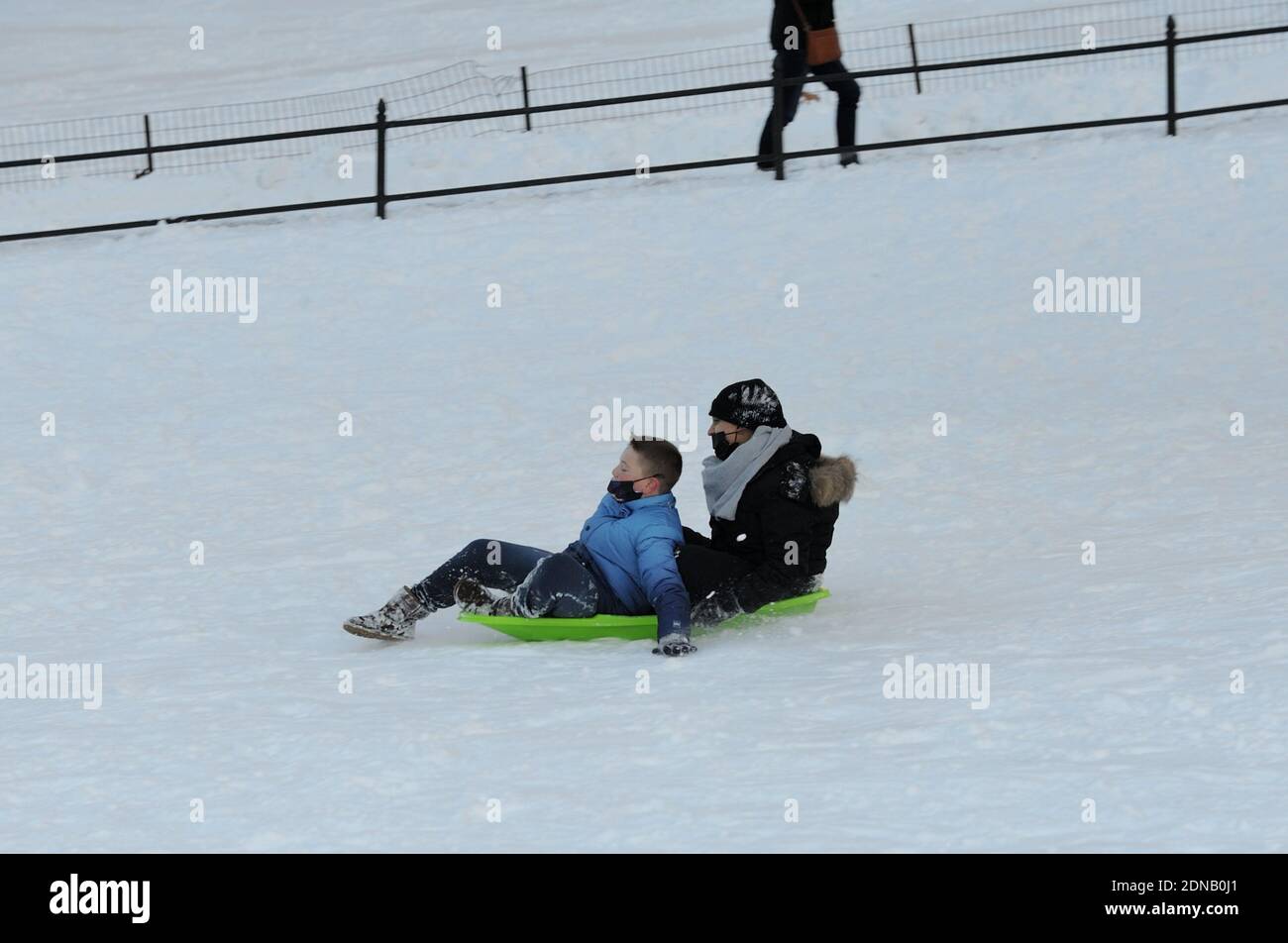New York, USA. 17th Dec, 2020. Kids enjoying the snow day, sledding in ...
