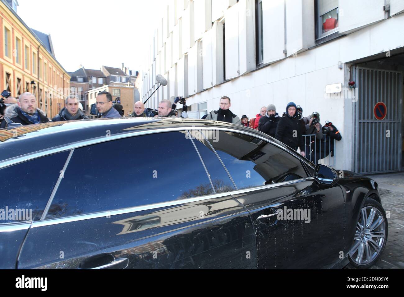 A car carying Dominique Strauss-Kahn arrives at the Lille Criminal Court for the Carlton case trial opening, in Lille, northern France on February 2, 2015. The case is named after a hotel at the centre of an alleged prostitution network with a cast of accused including former IMF managing director Dominique Strauss-Kahn, a police commissioner, the owner of a chain of brothels named Dodo la Saumure, a barrister, two luxury hotel directors and several freemasons. Photo by ABACAPRESS.COM Stock Photo