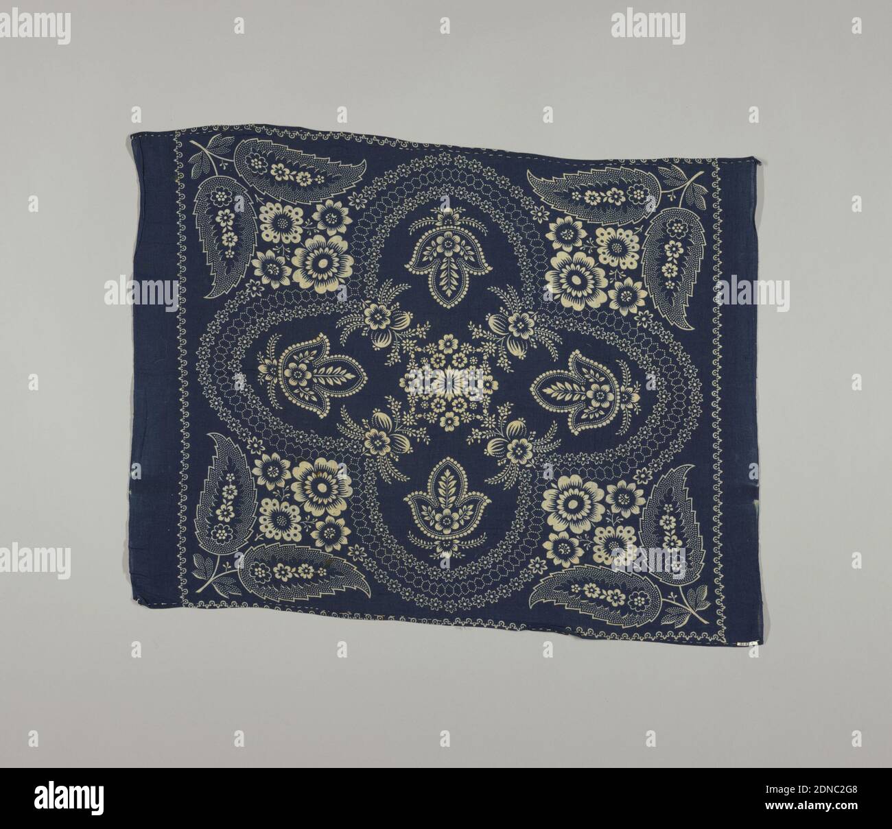 Square, Medium: cotton Technique: discharge printed, Blue handkerchief printed with a design of white flowers, leaves and dots., possibly Germany, 19th century, printed, dyed & painted textiles, Square Stock Photo