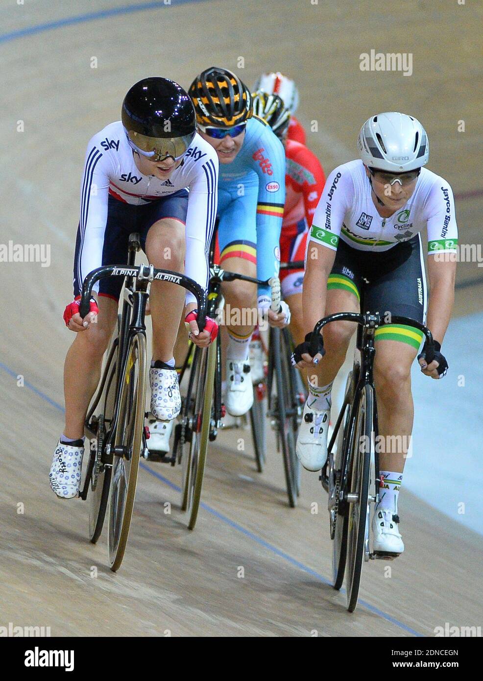 Annette Edmondson celebrates with an Australian flag after placing first in the Women's Omnium competition after competing in the Women's Omnium race at the UCI Track Cycling World Championships in