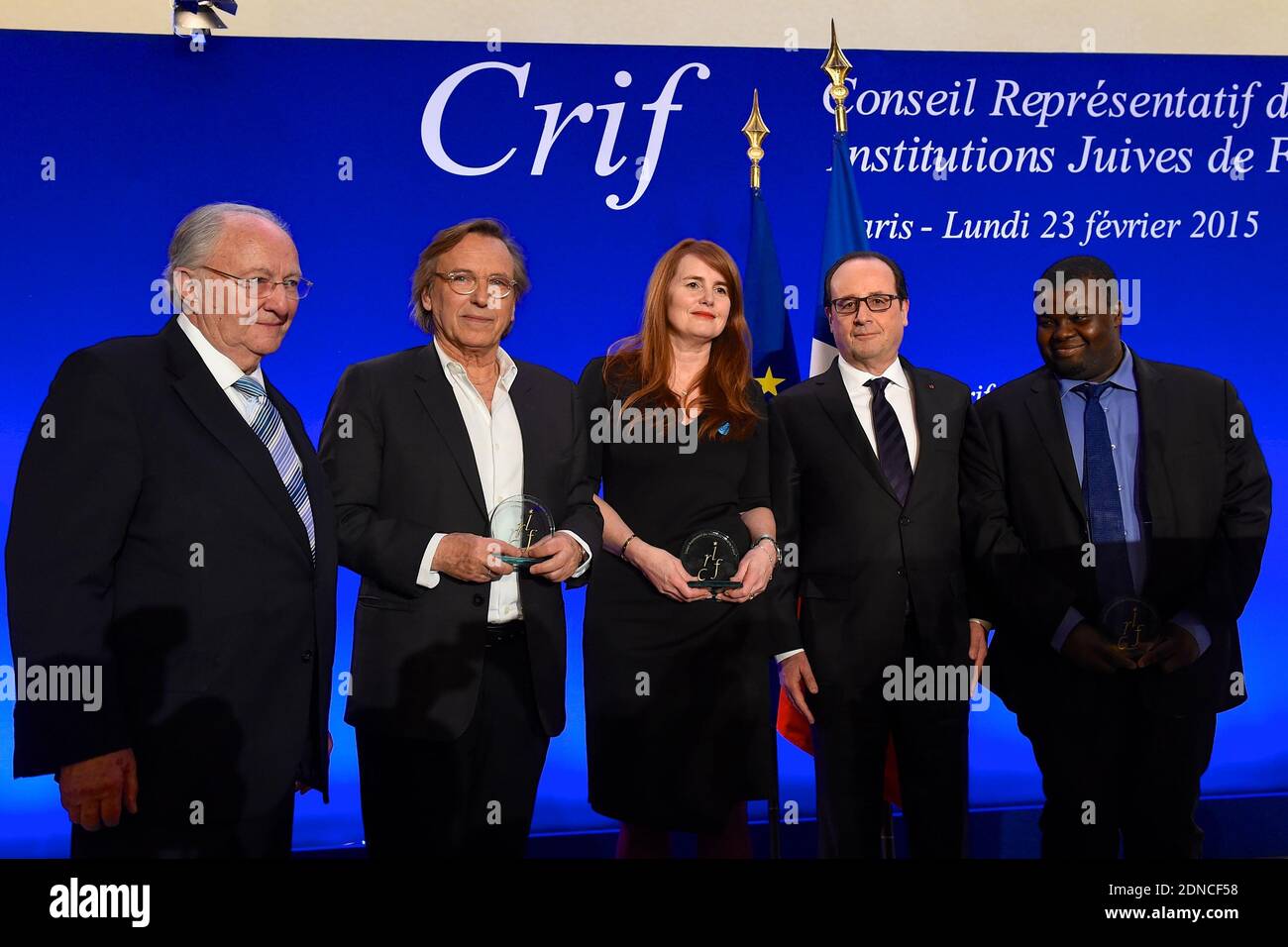 (L-R) CRIF president Roger Cukierman, director Alexander Arcady, producer Marie-Castille Mention-Schaar, French President Francois Hollande and the cousin of Lassana Bathily during the 30th annual Dinner of the Representative Council of the Jews of France (CRIF) held at the Pullman Montparnasse Hotel in Paris, France on February 23, 2015. Photo Pool by Erez Lichtfeld/ABACAPRESS.COM Stock Photo