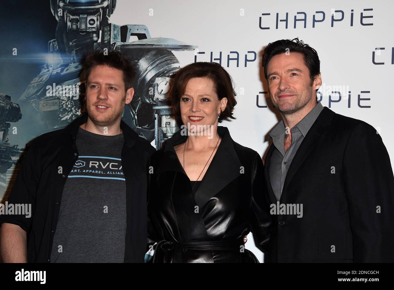 Neill Blomkamp, Sigourney Weaver and Hugh Jackman pose at a photocall for the film Chappie at the Hotel Bristol in Paris, France, on February 26, 2015. Photo by Nicolas Briquet/ABACAPRESS.COM Stock Photo