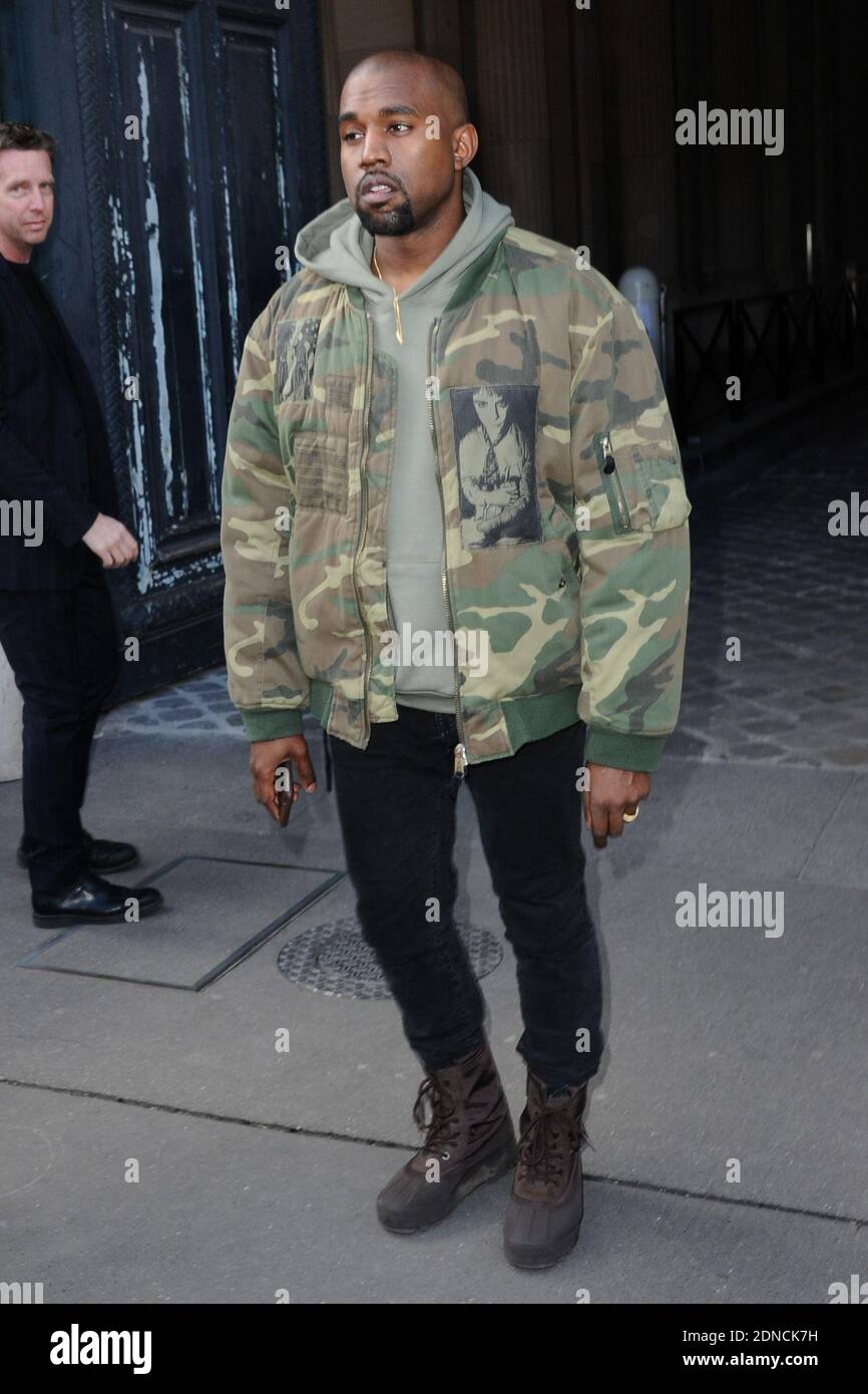 Kanye West arriving for the Dries van Noten Fall-Winter 2015/2016  Ready-to-Wear collection show held at Hotel de Ville in Paris, France on  March 04, 2015. Kanye is wearing a jacket by Raf