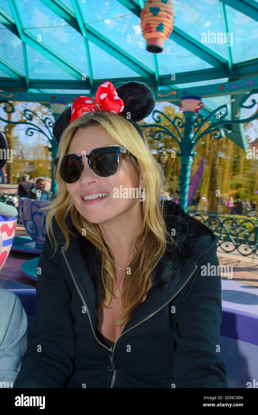 British supermodel Kate Moss poses for photographs during her first ever visit to Disneyland Resort Paris, in Marne-la-Vallee, near Paris, France on March 8, 2015. Kate was accompanied by daughter Lila Grace and husband Jamie Hince. Photo by Disneyland Paris/ABACAPRESS.COM Stock Photo