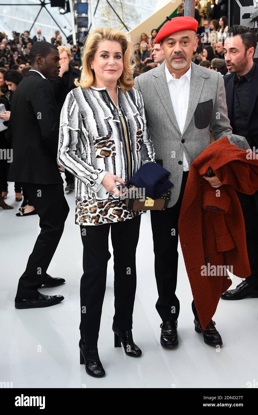 Catherine Deneuve and Christian Louboutin arrive to Louis Vuitton  Fall/Winter 2015-2016 Ready-To-Wear