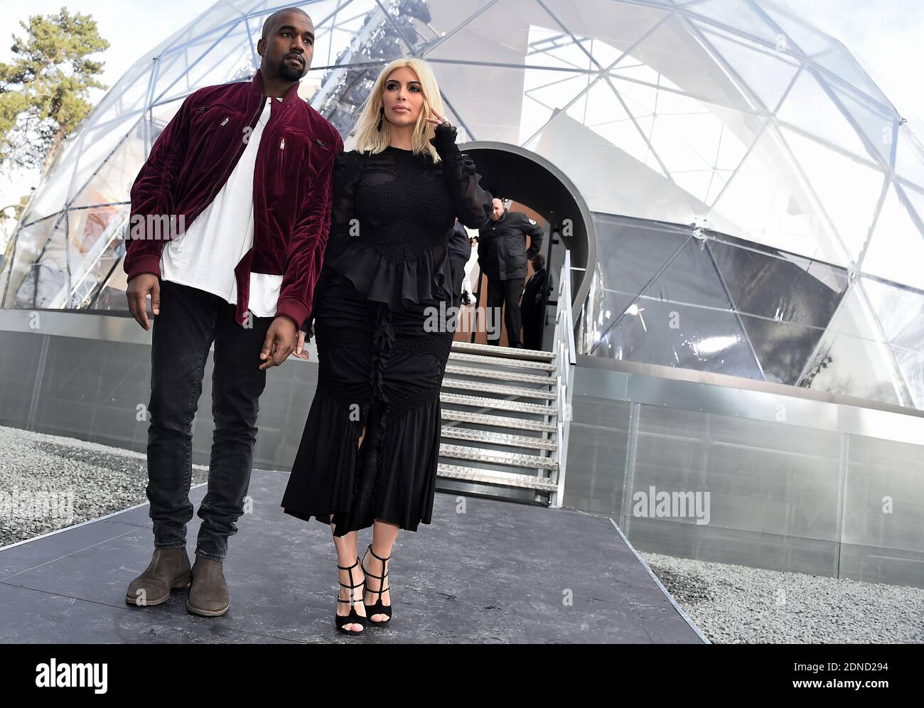 Kanye West and Kim Kardashian arrive to Louis Vuitton Fall/Winter