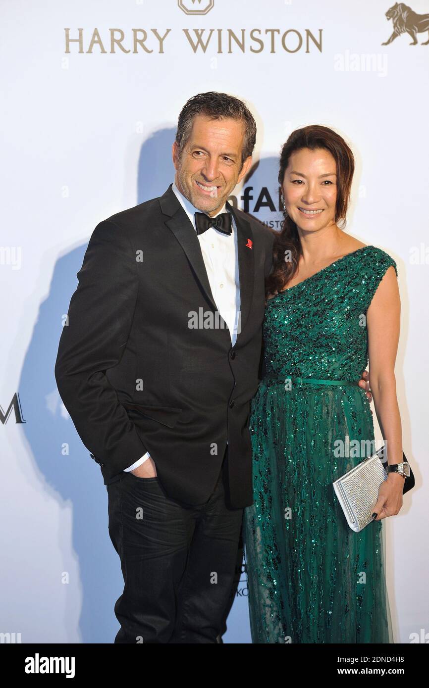 amfAR Chairman Kenneth Cole (left) and Michelle Yeoh (right) arrive on