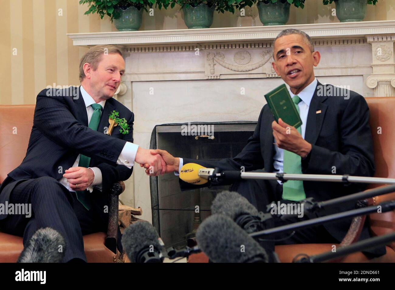 the President and the Vice President meet with Prime Minister (Taoiseach) Enda Kenny of Ireland in the Oval Office. President Obama is holding a book by Yates--a gift from the Prime Minister. Washington, DC, USA, on March 17, 2015. Photo by Dennis Brack/Pool/ABACAPRESS.COM Stock Photo