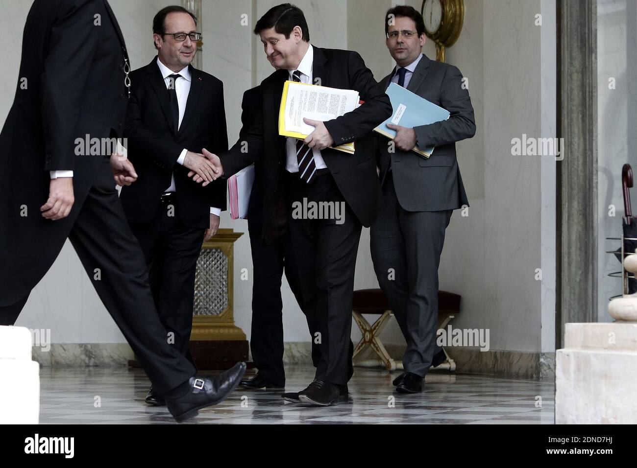 French President, Francois Hollande, French Sports minister, Patrick Kanner and French Secretary of State for Foreign Trade, Tourism Promotion and French Citizens Living Abroad Matthias Fekl leaves the weekly cabinet meeting at the Elysee Palace in Paris, France, on march 19, 2015. Photo by Stephane Lemouton/ABACAPRESS.COM Stock Photo
