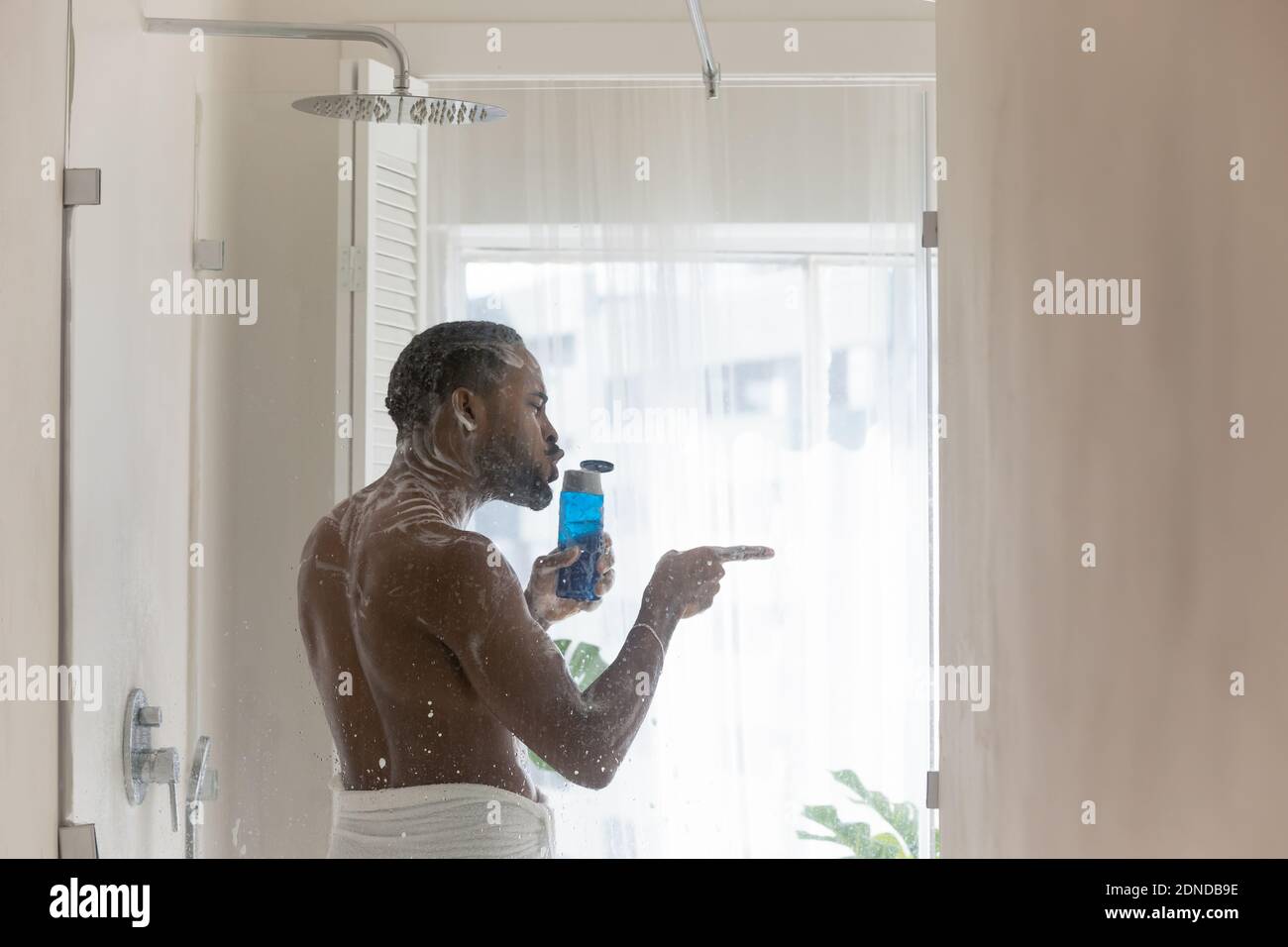 African Man Shower High Resolution Stock Photography and Images - Alamy