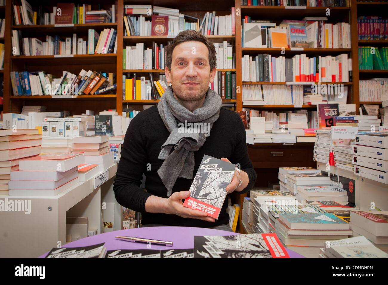 The winner of the Prix du Roman Thriller 2015 Olivier Taveau signs copies of his book 'Les Ames Troubles' at 'Des Livres et des hommes' bookstore during the 7th Thriller Film Festival (Festival International du Film Policier) in Beaune, France on March 28, 2015. Photo by Audrey Poree/ABACAPRESS.COM Stock Photo