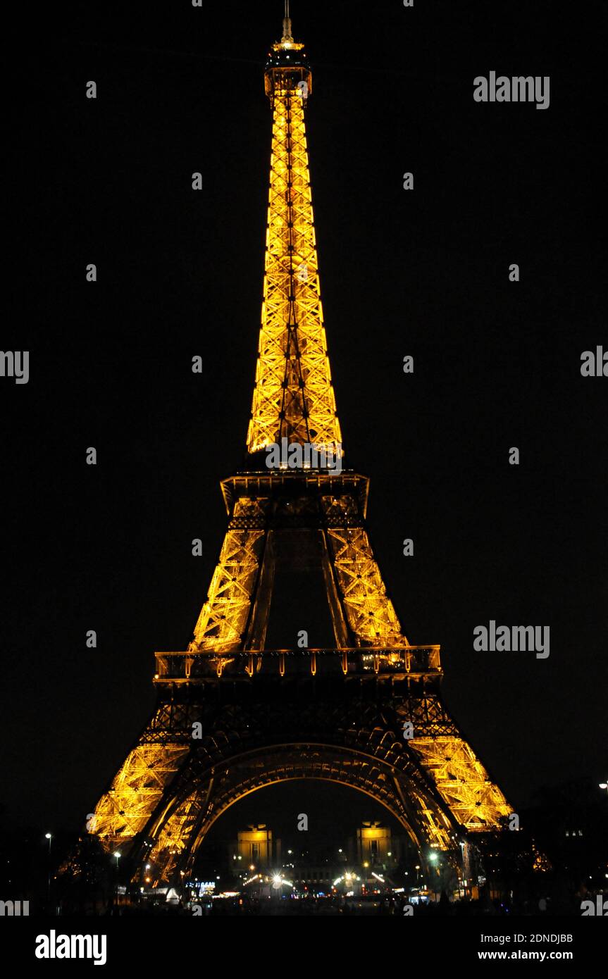 The Eiffel Tower is seen before WWF's Earth Hour, raising awareness about climate change. Paris, France, Saturday March 28, 2015. The event has seen more than 700 landmarks around the world switch off their lights. Photo by Alain Apaydin/ABACAPRESS.COM Stock Photo