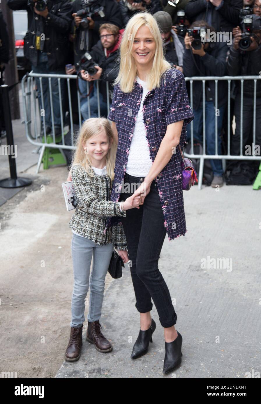 Backstage Milan Spring Summer Prada Model Carmen Kass long stright blonde  hair brown roots, pale pinkmatt lipstick, looking to Stock Photo - Alamy