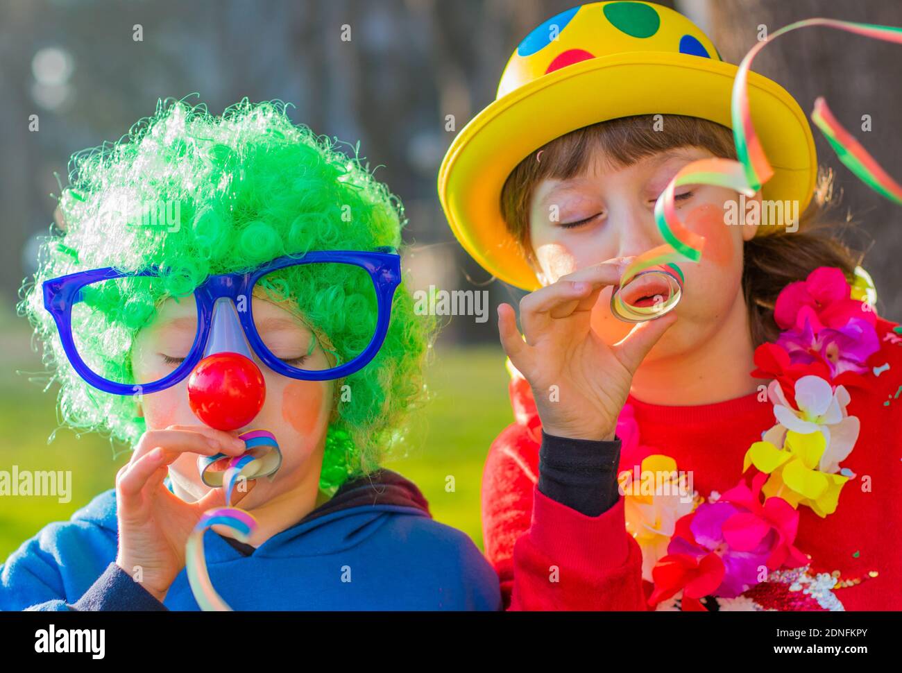 Boys holding ribbons hi-res stock photography and images - Alamy