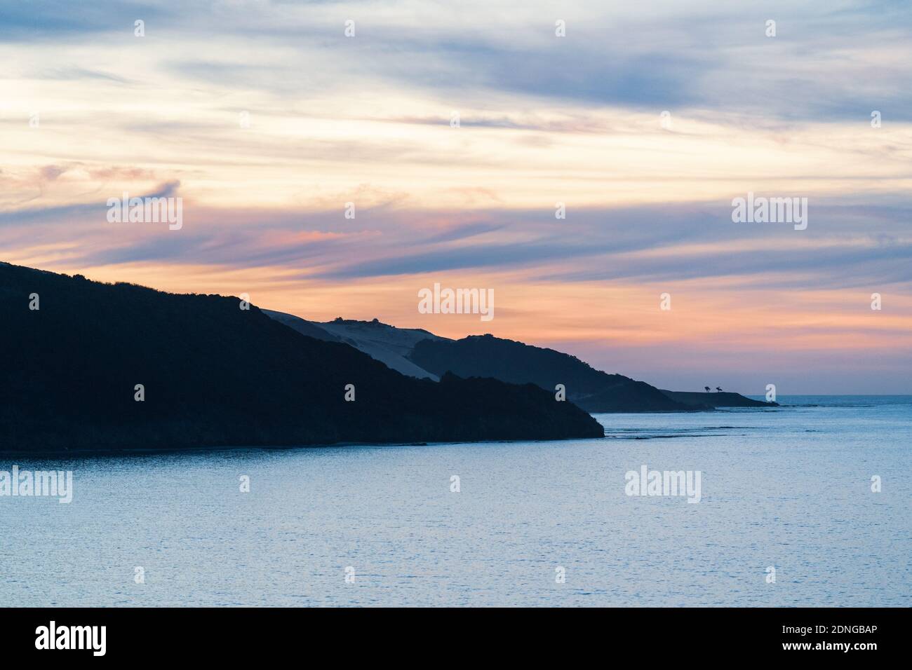 Scenic View Of Sea Against Sky During Sunset Stock Photo