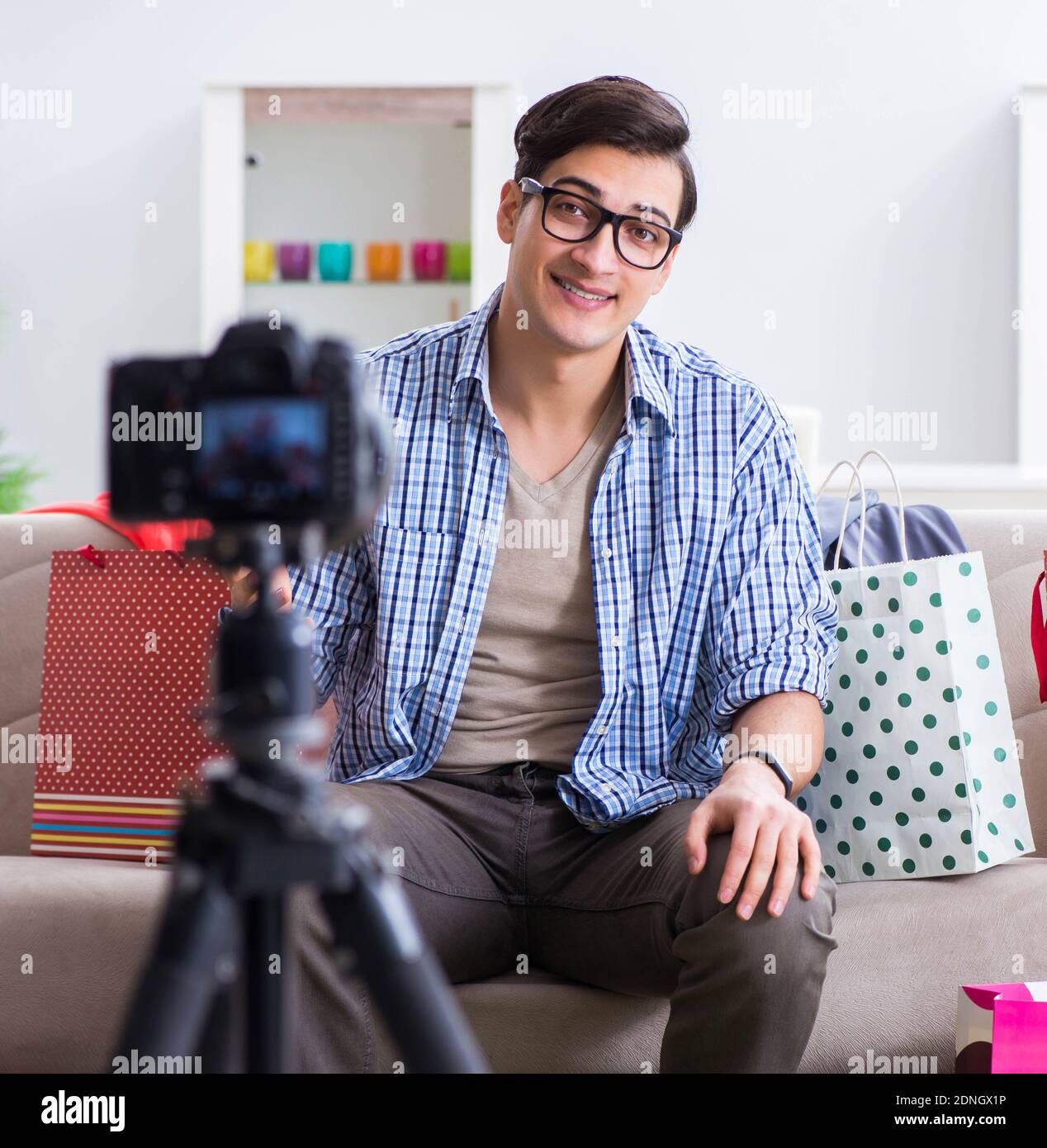 The male fashion blogger recording video for vlog Stock Photo Alamy