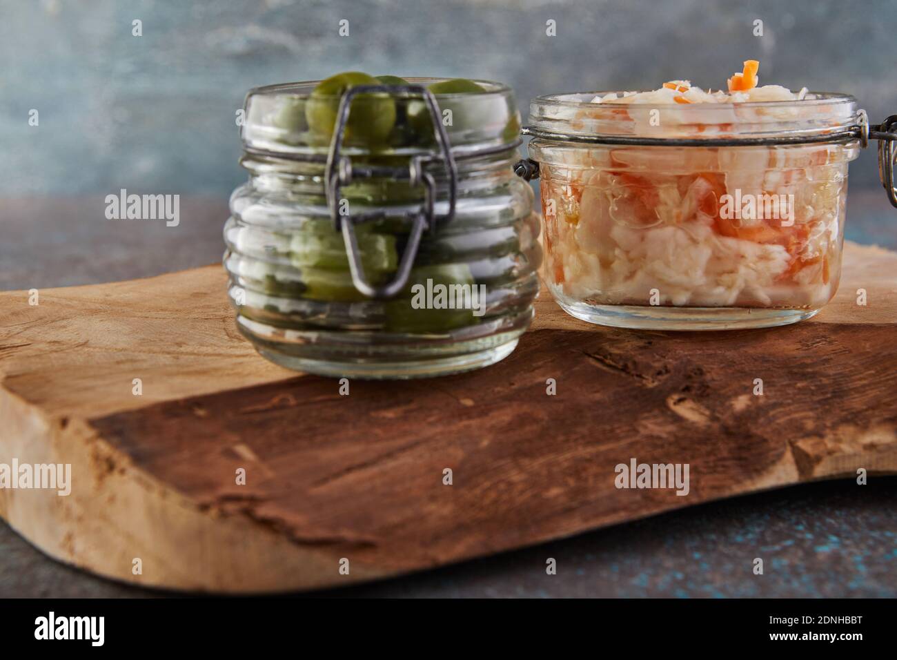 Fermented vegetarian canned food concept. Sauerkraut and olives in