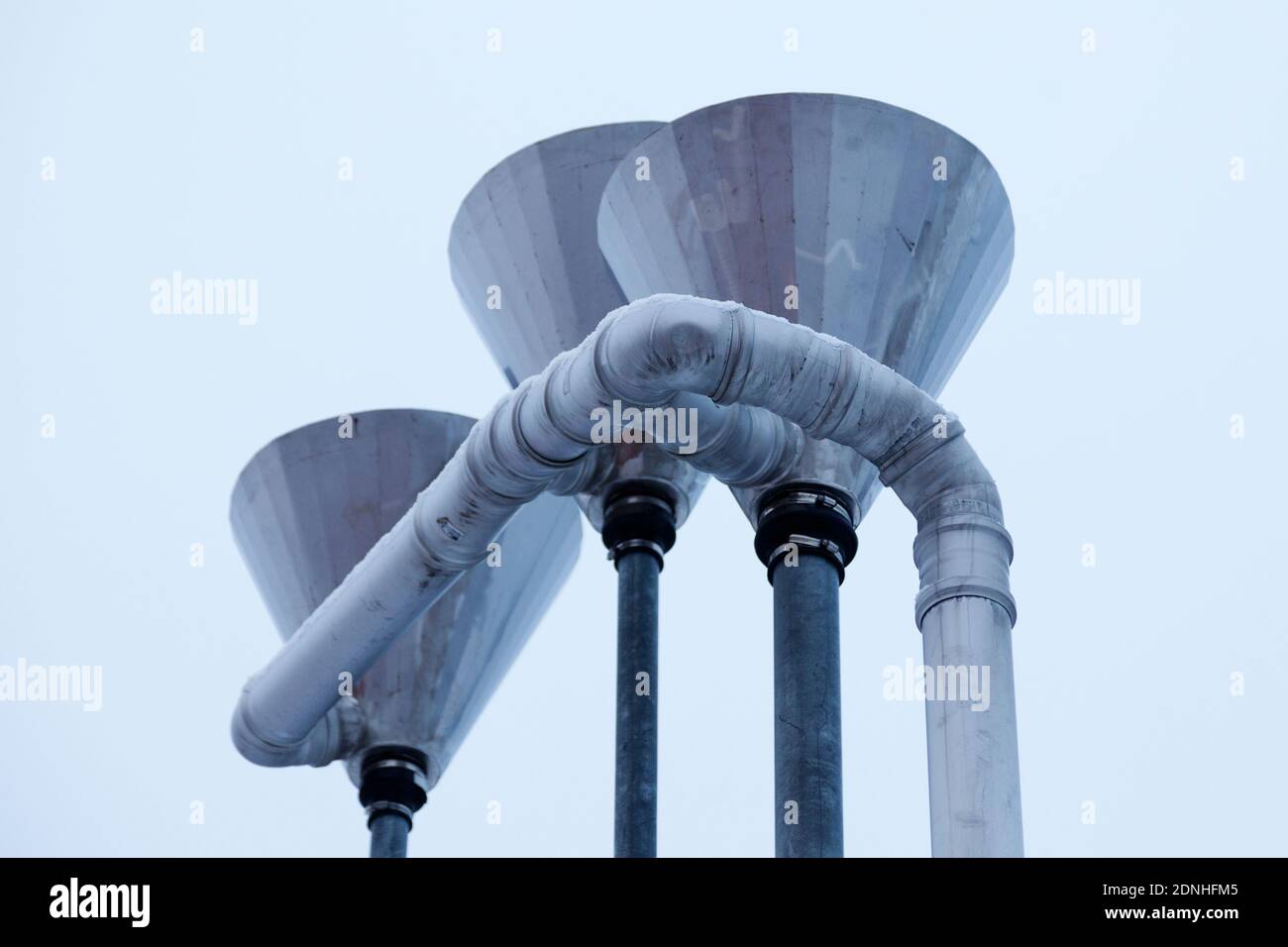 funnels and pipes associated with gas station pumps Stock Photo