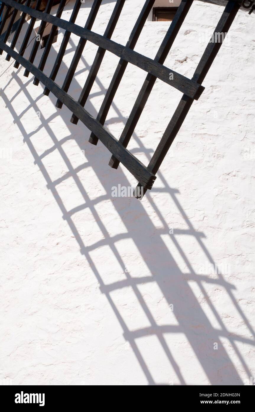 Detail of windmill arm and its shadow. Campo de Criptana, Ciudad Real province, Castilla La Mancha, Spain. Stock Photo