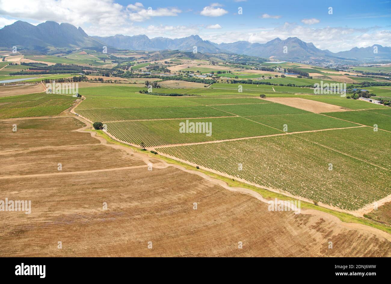 Cape Town, Western Cape / South Africa - 11/26/2020: Aerial photo of farming fields with mountains in the background Stock Photo
