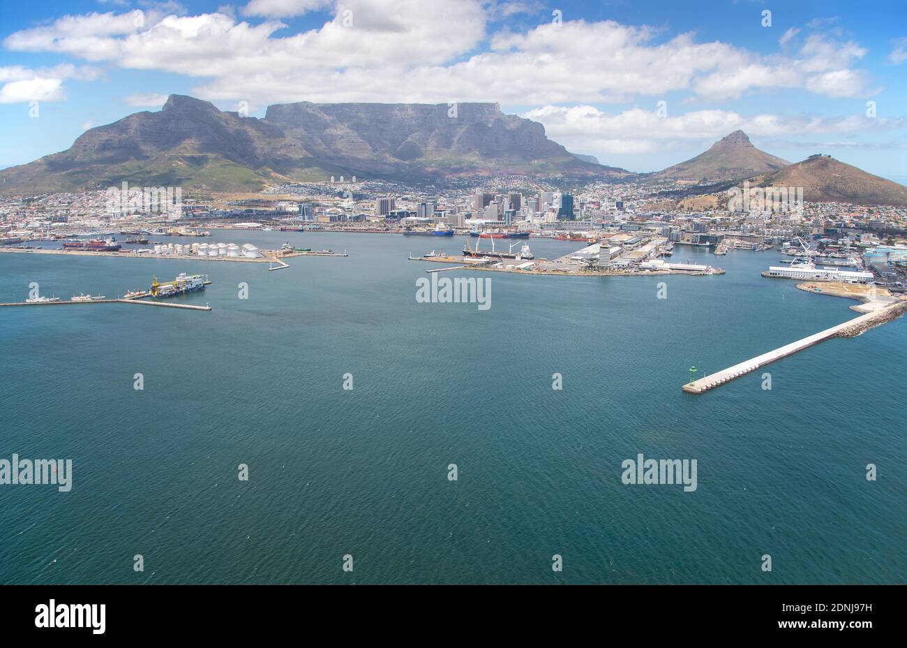 Cape Town, Western Cape / South Africa - 11/26/2020: Aerial photo of V&A Waterfront helipads and breakwater with Table Mountain in the background Stock Photo
