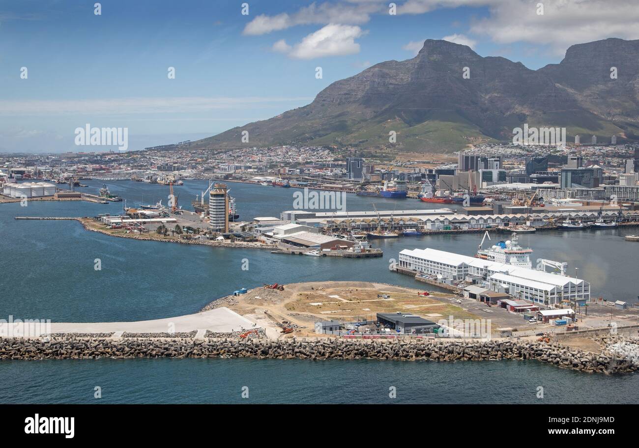 Cape Town, Western Cape / South Africa - 11/26/2020: Aerial photo of V&A Waterfront helipads and breakwater with Table Mountain in the background Stock Photo