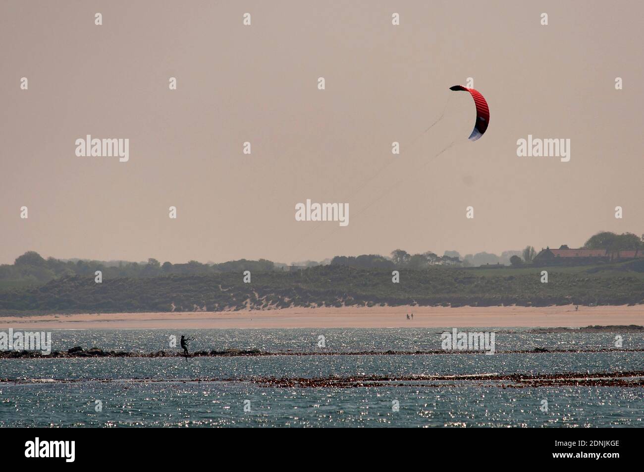 Kitesurfer, Beadnell Bay, Northumberland Stock Photo