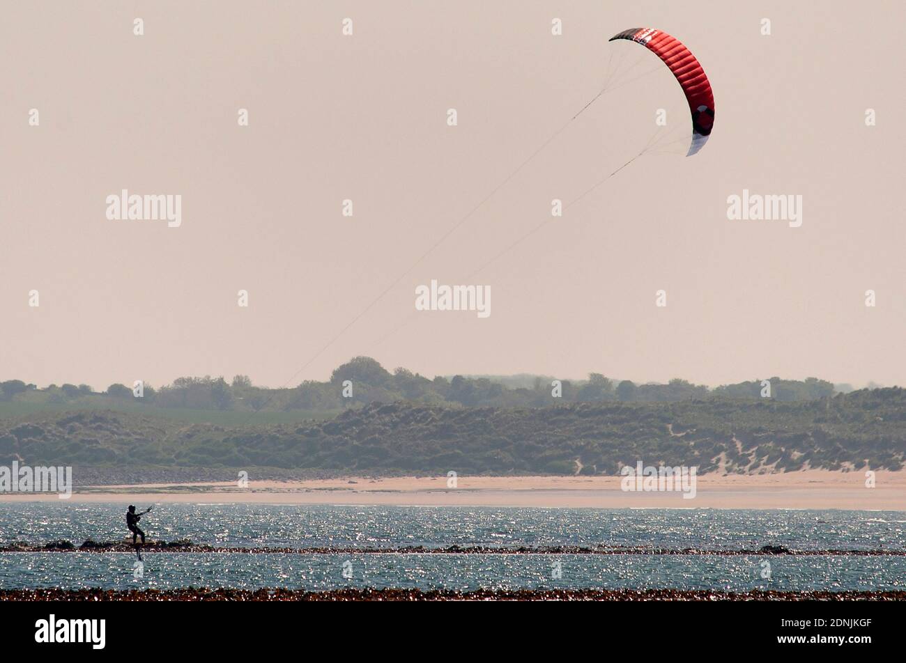Kitesurfer, Beadnell Bay, Northumberland Stock Photo