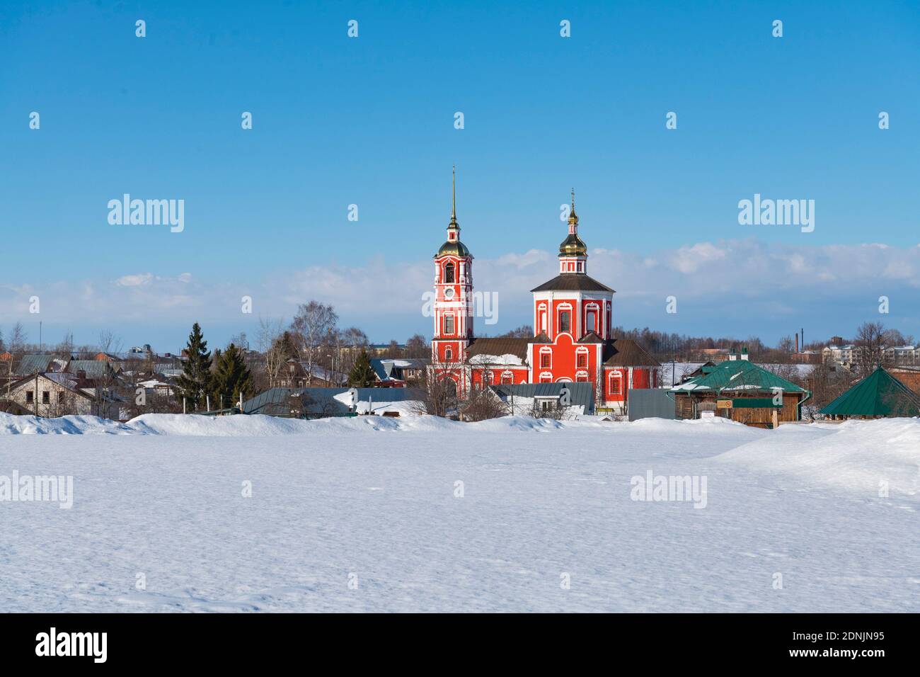 Snow Covered Buildings Against Sky Stock Photo