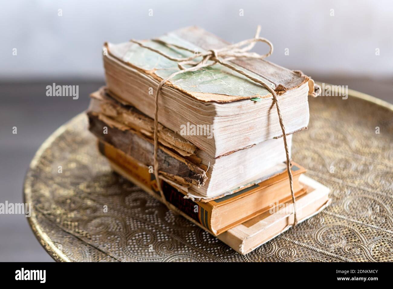 Old 100 years books on antique table closeup. History, knowledge