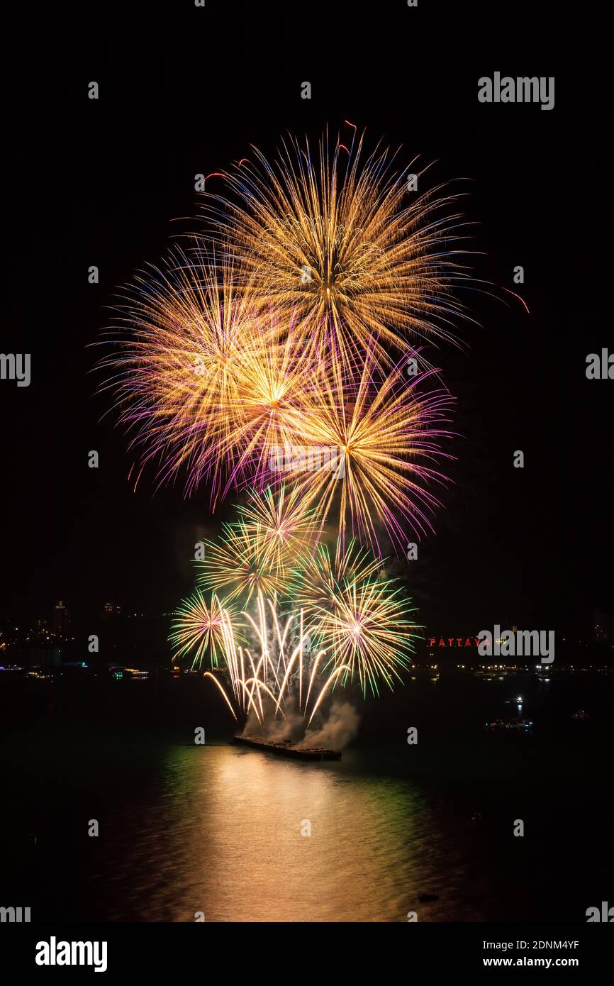 Colorful firework over Pattaya beach during International Festival, celebration for New Year Stock Photo