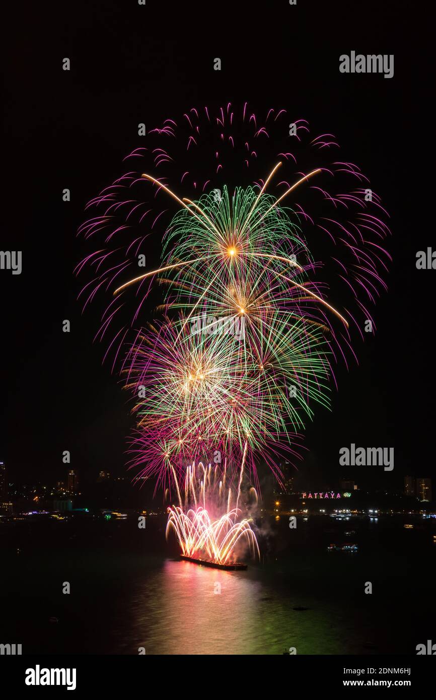 Colorful firework over Pattaya beach during International Festival, celebration for New Year Stock Photo