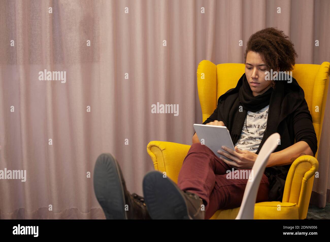Man using digital tablet Stock Photo