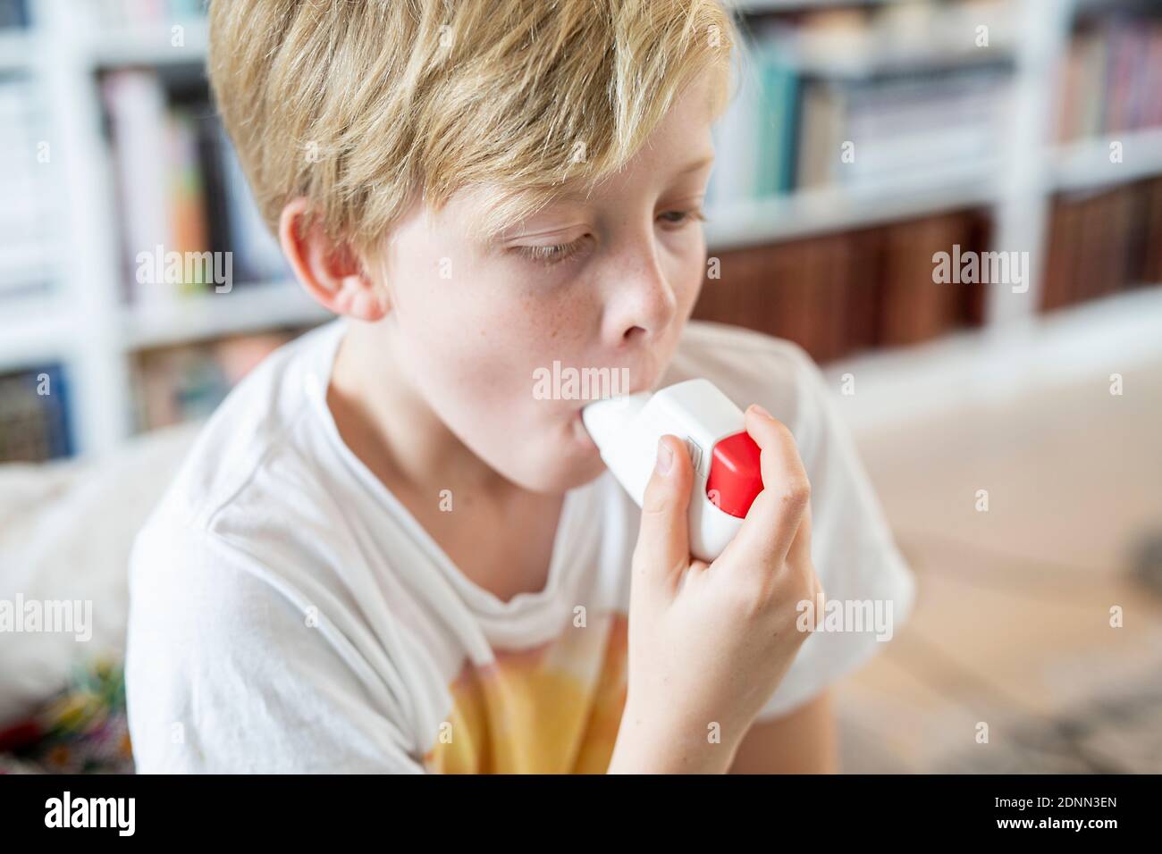 Boy using inhaler Stock Photo - Alamy