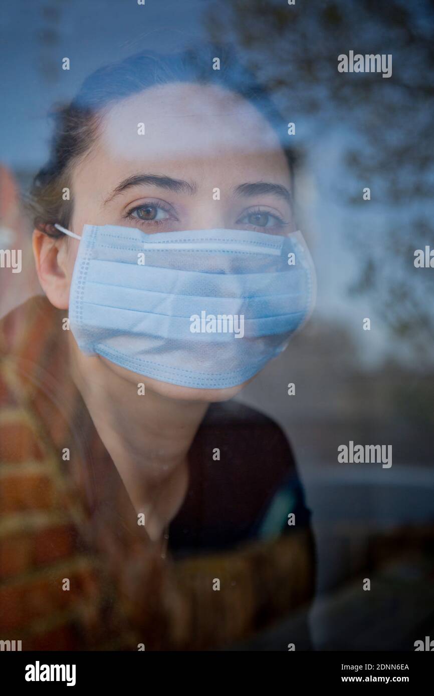 Woman wearing protective mask Stock Photo