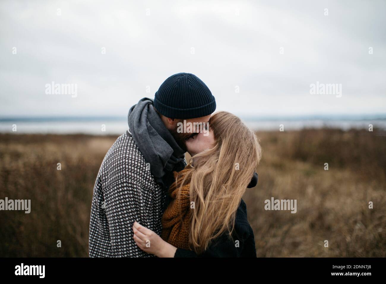 Couple standing together Stock Photo