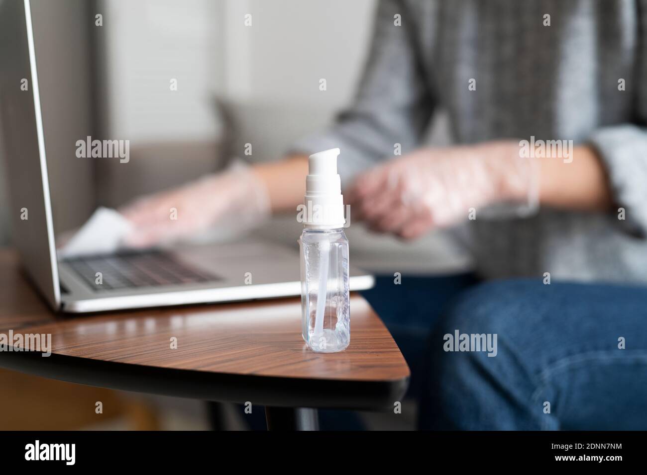 Hand sanitizer on desk Stock Photo Alamy