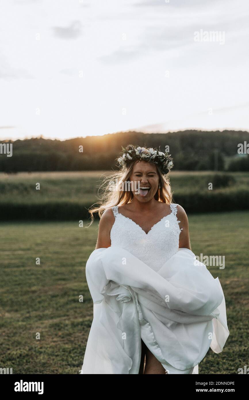 Bride sticking her tongue out Stock Photo