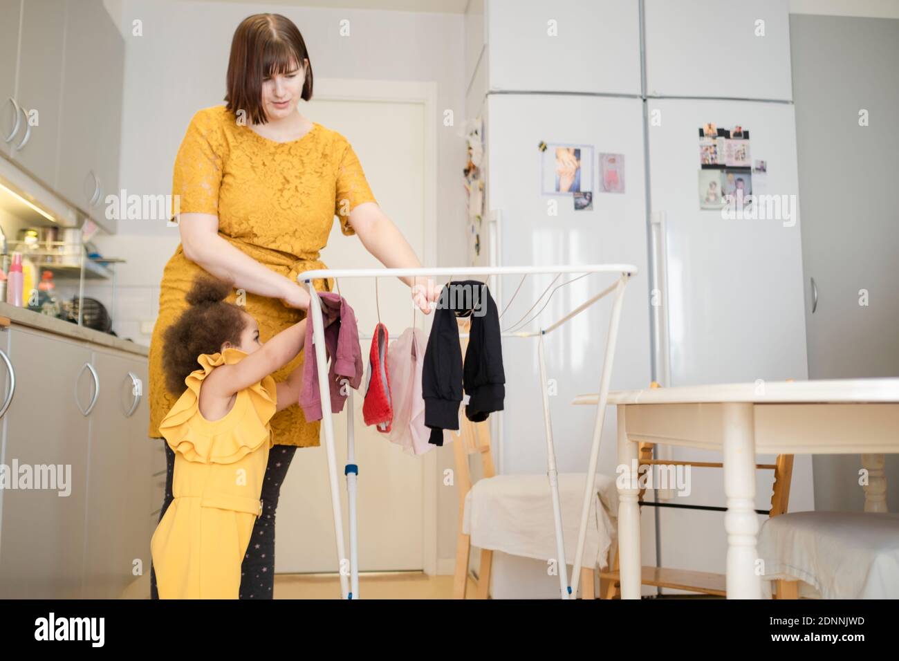 Mother with daughter at home Stock Photo