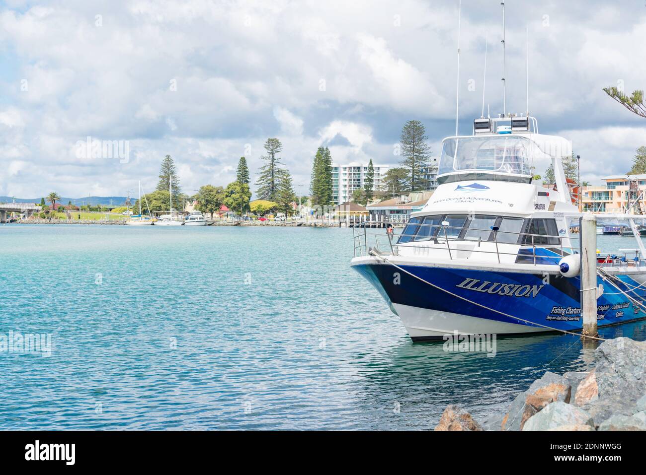 A fishing charter hire boat moored in the harbour at Forster Tuncurry, New South Wales, Australia Stock Photo
