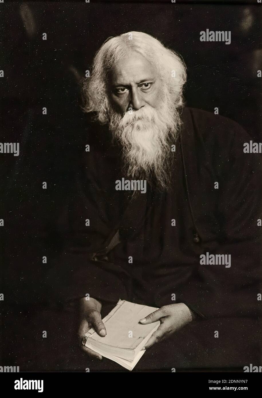 Hugo Erfurth, Rabindranath Tagore, from the album Ausstellung Hugo Erfurth - Bildnisse aus dem XX. Jahrhundert, Konstanz 1949, silver gelatin paper, black and white positive process, picture size: height: 17,1 cm; width: 12,4 cm, inscribed: Passepartout recto u. re. : in lead: 16, portrait photography, portrait, writer, poet, author, book, portrait, self-portrait of an artist, scholar, philosopher, Rabindranath Tagore, At the beginning of the 20th century, Hugo Erfurth is one of the most famous professional photographers in Germany, along with Rudolph Dührkoop and Nicola Perscheid. Stock Photo